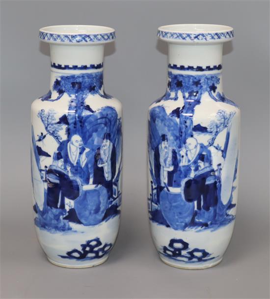 A pair of late 19th century Chinese blue and white vases, bearing Kangxi mark height 29.5cm